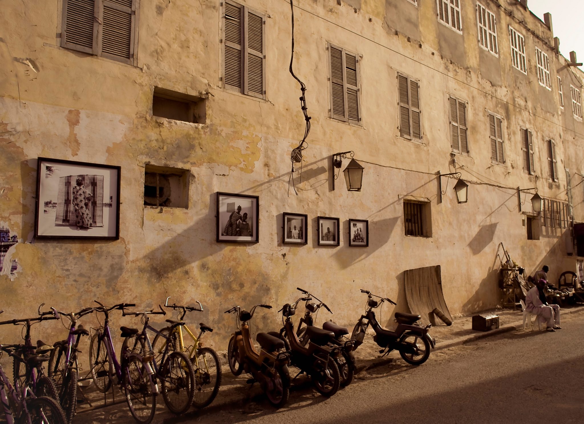 Bicycles and Photographs Near the Office of Ismael