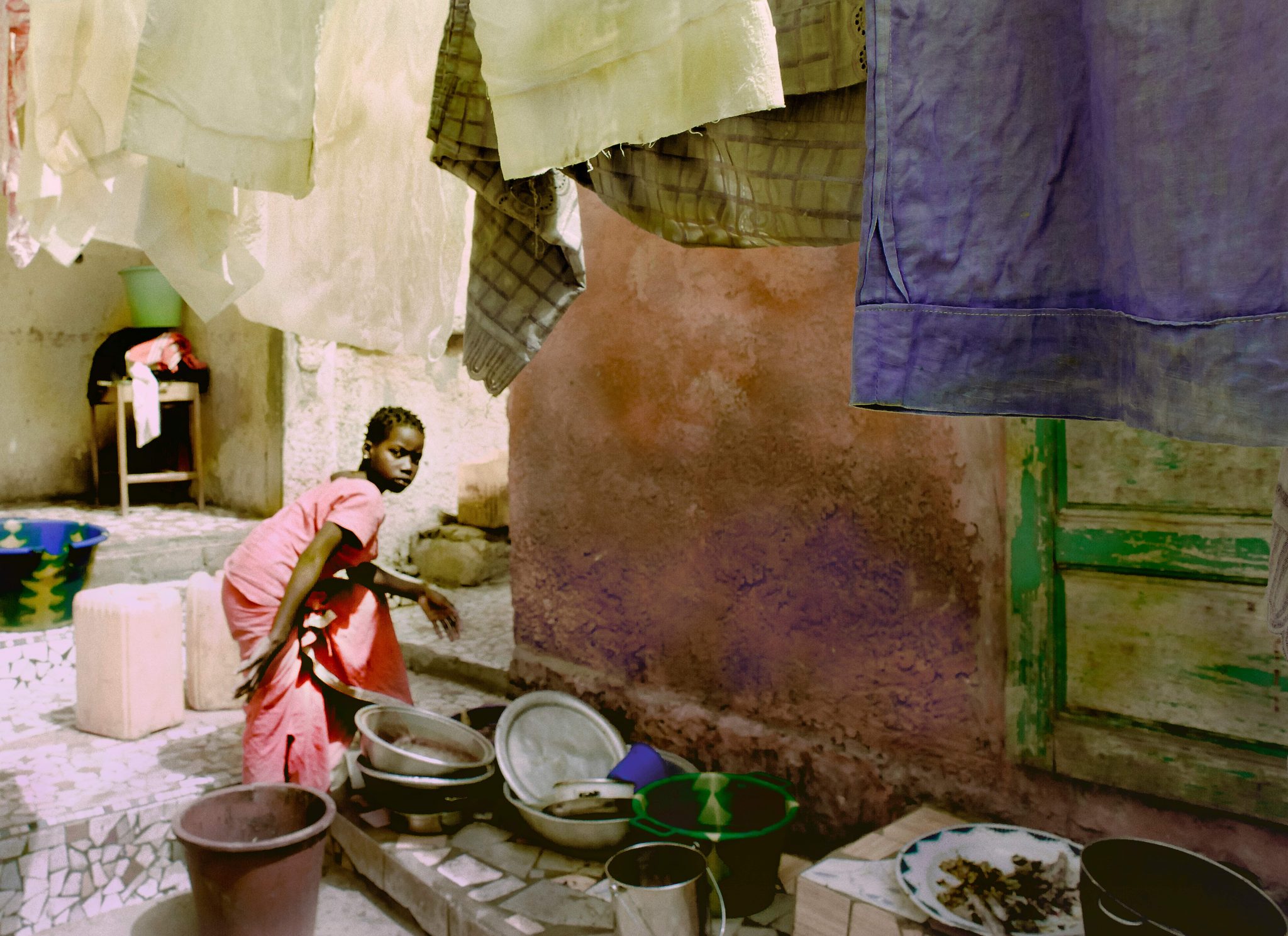 Road to Podor, Girl Washing Clothes